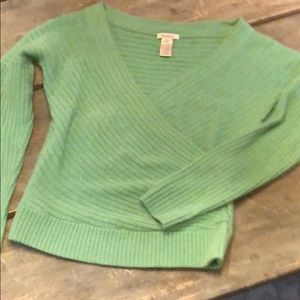 Ladies green sweater.